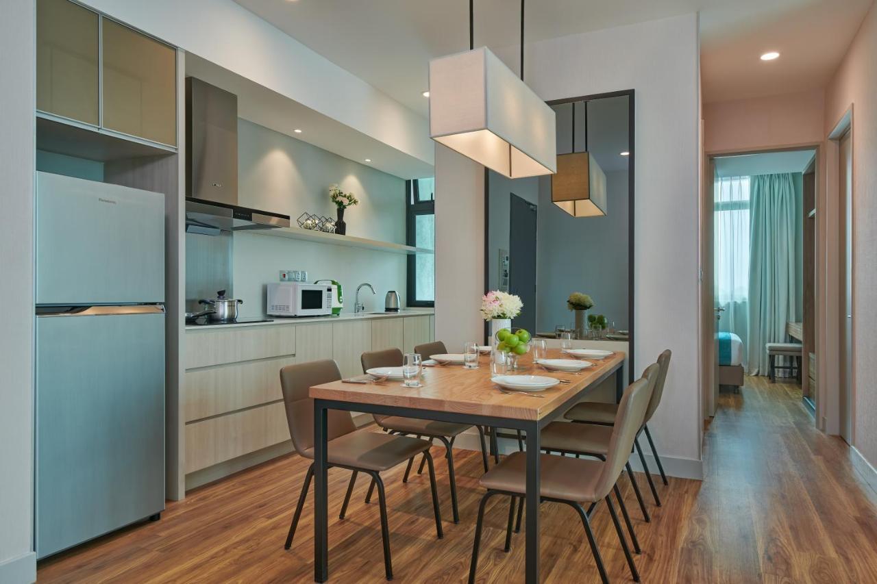 Mercure Living Putrajaya Exteriör bild A typical kitchen and dining room